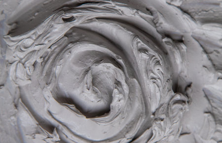 Clay texture spa mask for face and body. Selective focus.