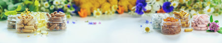 Homeopathy and dietary supplements from medicinal herbs. Selective focus.