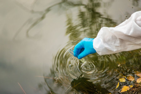 Take water samples for analysis. Selective focus.の写真素材