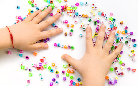 Child cubes and the word mother. Selective focus.