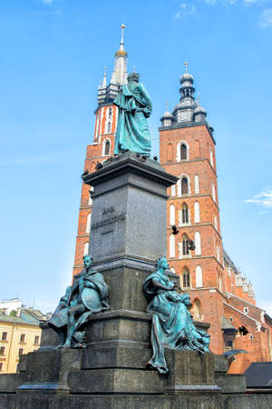 Krakow, Poland, MAY 05, 2016 - View of Main Market Square, Adam Mickiewicz Monument and St. Mary's Basilica in Krakow Old townのeditorial素材