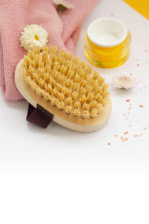 SPA skincare procedures with dry brush, cream, towel and sea saltの写真素材