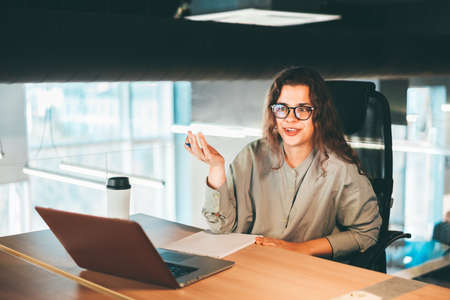 Girl making a video call at the office