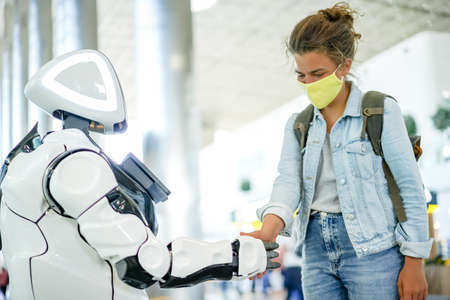 Robot and human handshake in public place