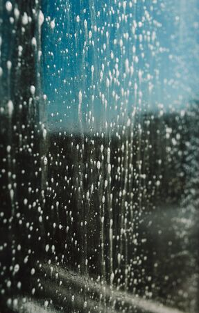 Detergent coated glassの写真素材