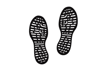 Human shoe footprints. Pair of prints of boots or sneakers. Left and right leg. Shoe sole. Black and white vector isolated on white background. Icon, symbol, pictogram. For print, design elementのイラスト素材
