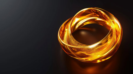 A glossy golden ring or bracelet with a textured surface and sparkling particles, isolated on a dark background, ideal for luxury branding or high-end jewelry advertisements. Banner with copy spaceの素材