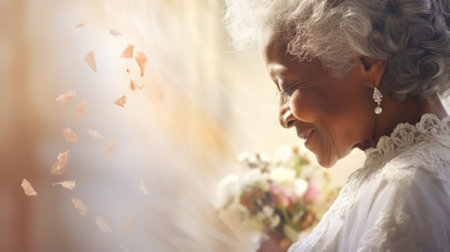 Smiling senior African American bride in a white wedding dress. Concept of wedding joy, senior love, new beginnings, celebratory moments, and elegant aging. Banner with copy spaceの素材