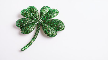 Sparkling Shamrock on White Background. Concept of St. Patrick's Day, Irish Symbol, Good Luck Charm...
