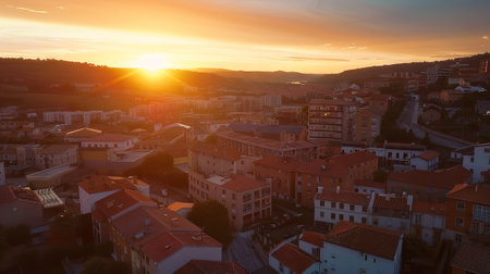 Breathtaking Urban Sunset Silhouette Over City Skyline Capturing Vibrant Colors and Tranquil Evening Mood. Concepts of Urbanization, Scenic Views, and Natural Beauty.の写真素材