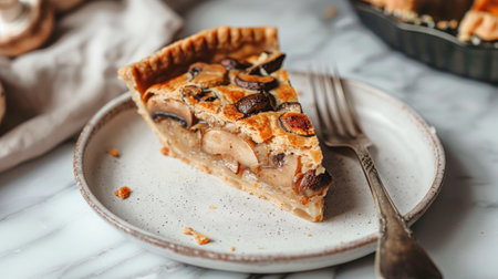 Slice of mushroom pie with parsley on a white plate. Concept of savory pastry, vegetarian food, bakery, culinary art.の写真素材