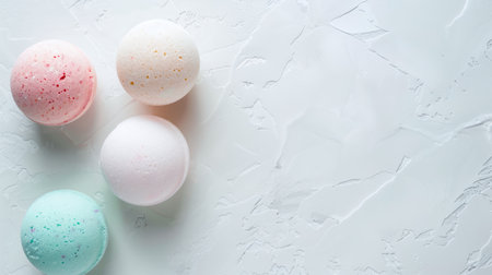 Variety of aromatic colorful bath bombs arranged on textured background. Concept of Spa, wellness, relaxation, beauty treatment, and aromatherapy. Banner. Copy space. Top viewの写真素材