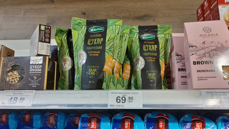 Dnipro, Ukraine - April 26, 2025 - Close-up of supermarket shelf displaying brown sugar from sugar...