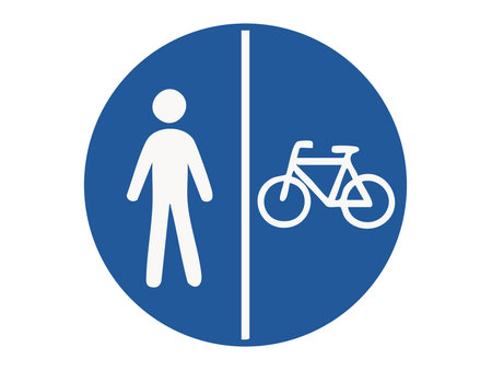 Mandatory road sign with separated pedestrian and bicycle lanes inside blue circle isolated on white background, graphic illustration. Concept of shared path, urban mobility, traffic rule.のイラスト素材