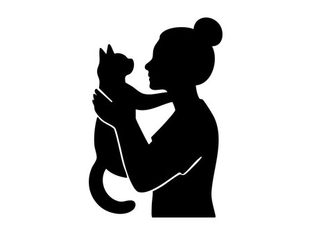 Black silhouette of woman holding cat, isolated on white background, graphic illustration. concept of pet, companionship, feline love, domestic animal, icon, design element.のイラスト素材