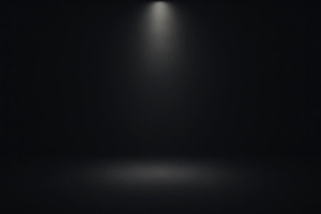 Simple spotlight effect creating a dramatic empty space ideal for theatrical productions and minimalist artistic presentations, concept of illumination, theater stage design.の写真素材