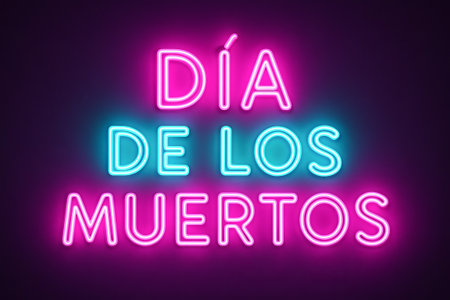 Neon dia de los muertos sign in bright pink and blue glowing letters on dark background for festive celebration. concept of mexican heritage, luminous decor, cultural tradition.の写真素材