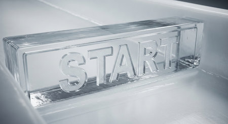 Ice block with start text embedded in frozen surface on a cold winter day. concept of new beginnings, fresh start, icy texture.の写真素材