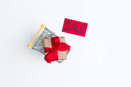 Shopping cart and box isolated on white background, business, shopping concept. Selective focus