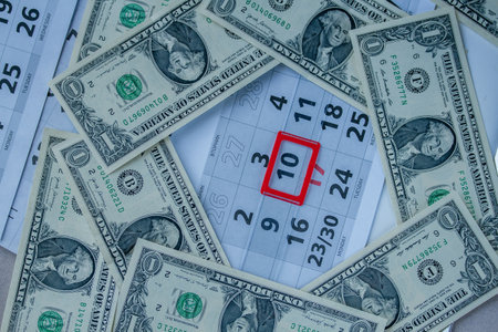 Banknotes of dollars on calendar sheets closeup
