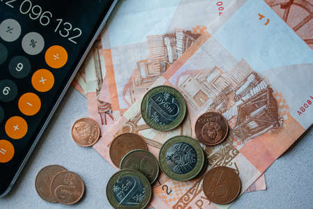New Money in Belarus. Denomination in Republic of Belarus 2016 Belarusian Rubles. Belarusian money. Belarusian Coins. piggy bank, financial statements, calculatorの写真素材