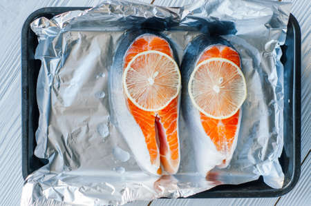red fish dishes, healthy nutrition concept. Fish baked in foil.の写真素材