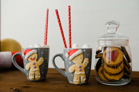 Christmas sweets. cup with cookie figurine, christmas and new year concept