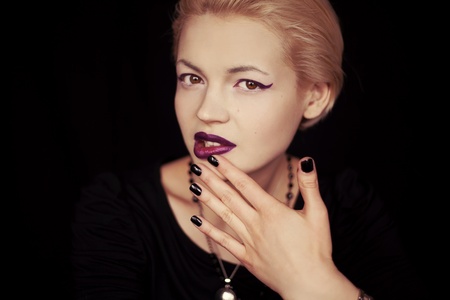 Beautiful girl with brightly colors of make-upの写真素材