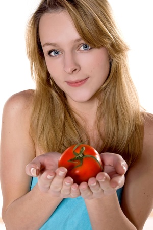 beautiful woman with tomatoの写真素材
