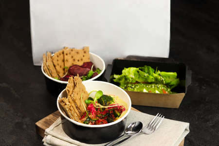 Lunch boxes with food ready for work or school, pre-cooking or diet. Healthy food delivery service...