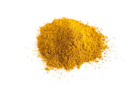 Heap of curry powder isolated on white background. Top view.の写真素材