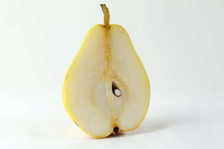 Half pear slice isolated on white backgroundの写真素材