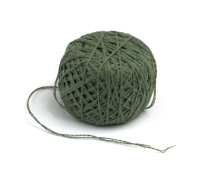 Green thread clew isolated over white background の写真素材