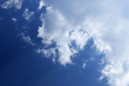 Blue sky with cloudsの写真素材