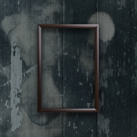 photo frame on a wood backgroundの写真素材