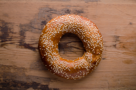 bagel on a wooden backgroundの写真素材