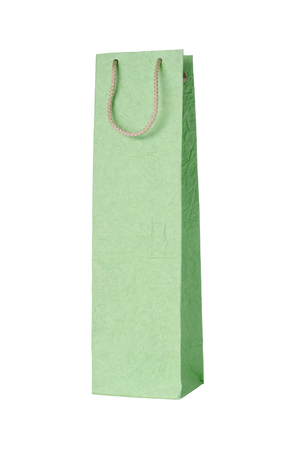 Green paper bag on white backgroundの写真素材