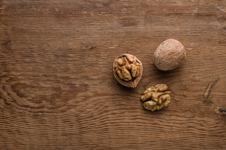 walnut on a wooden backgroundの写真素材