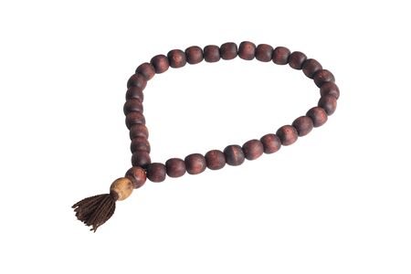 Wooden rosary isolated on white backgroundの写真素材