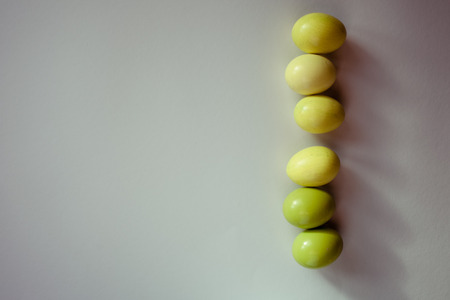 Easter background with Easter eggs. Spring and Easter holiday concept with copy space. Minimalistic...