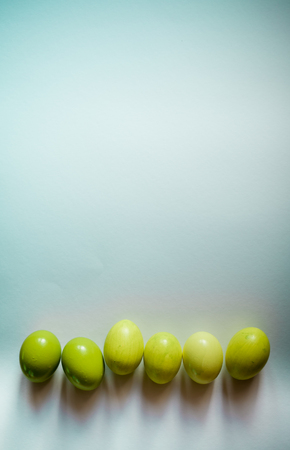 Easter background with Easter eggs. Spring and Easter holiday concept with copy space. Minimalistic design.の写真素材