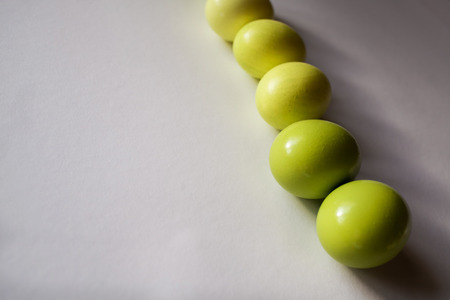 Easter background with Easter eggs. Spring and Easter holiday concept with copy space. Minimalistic design.の写真素材