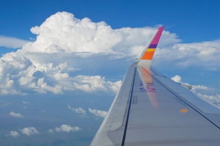 Wing air plane and Cloud with Blue skyの写真素材