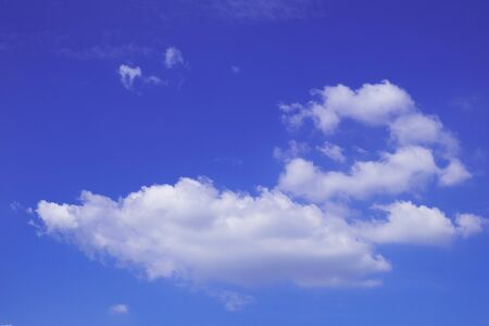 Clear blue sky and white cloudの写真素材