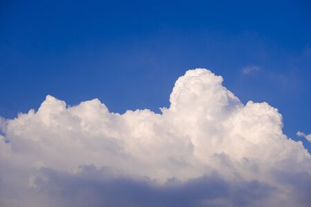 Big cloud under blue skyの写真素材