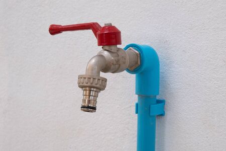 Tap or valve and blue pipeの写真素材