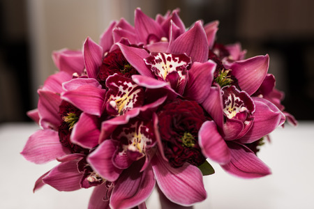 Wedding beautiful bouquet with orchids of marsala colors.の写真素材
