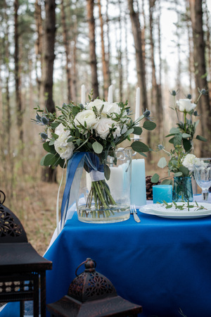White wedding bouquet in the glass vase. Wedding table. Decor.の写真素材