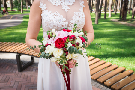 Wedding bouquet with white and red roses, eucalyptus and hydrangeaの写真素材