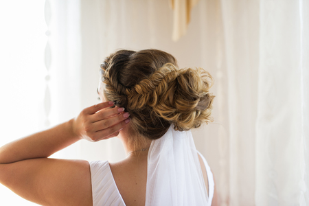 Beautiful air wedding hairstyle view from the backの写真素材